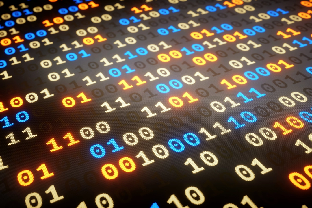 Binary code on a screen illustrating data serialization and the importance of understanding Python Pickle Module security risks and safer alternatives for secure coding practices.